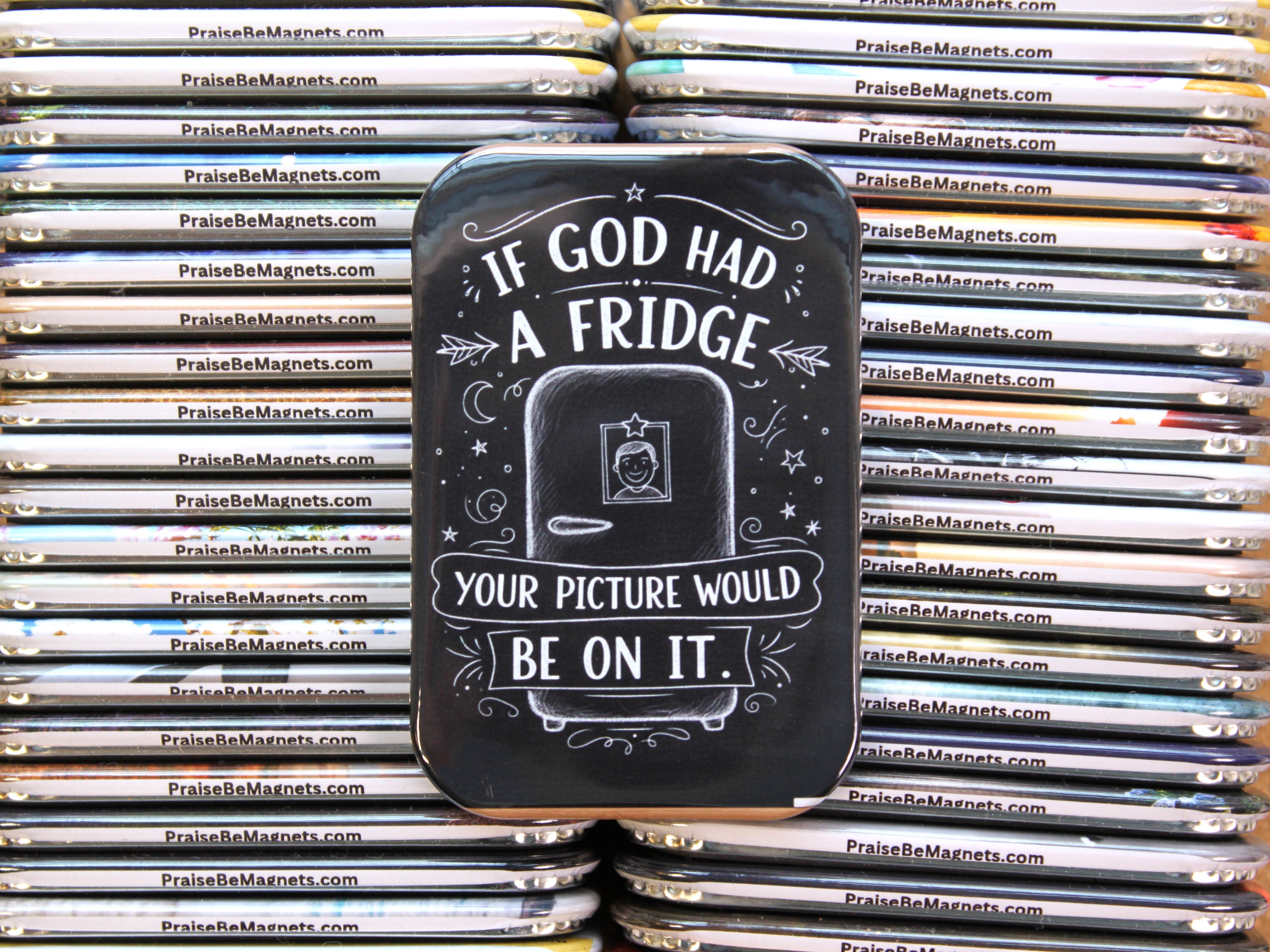 Tin with 'If God had a fridge, your picture would be on it' text among other magnets.