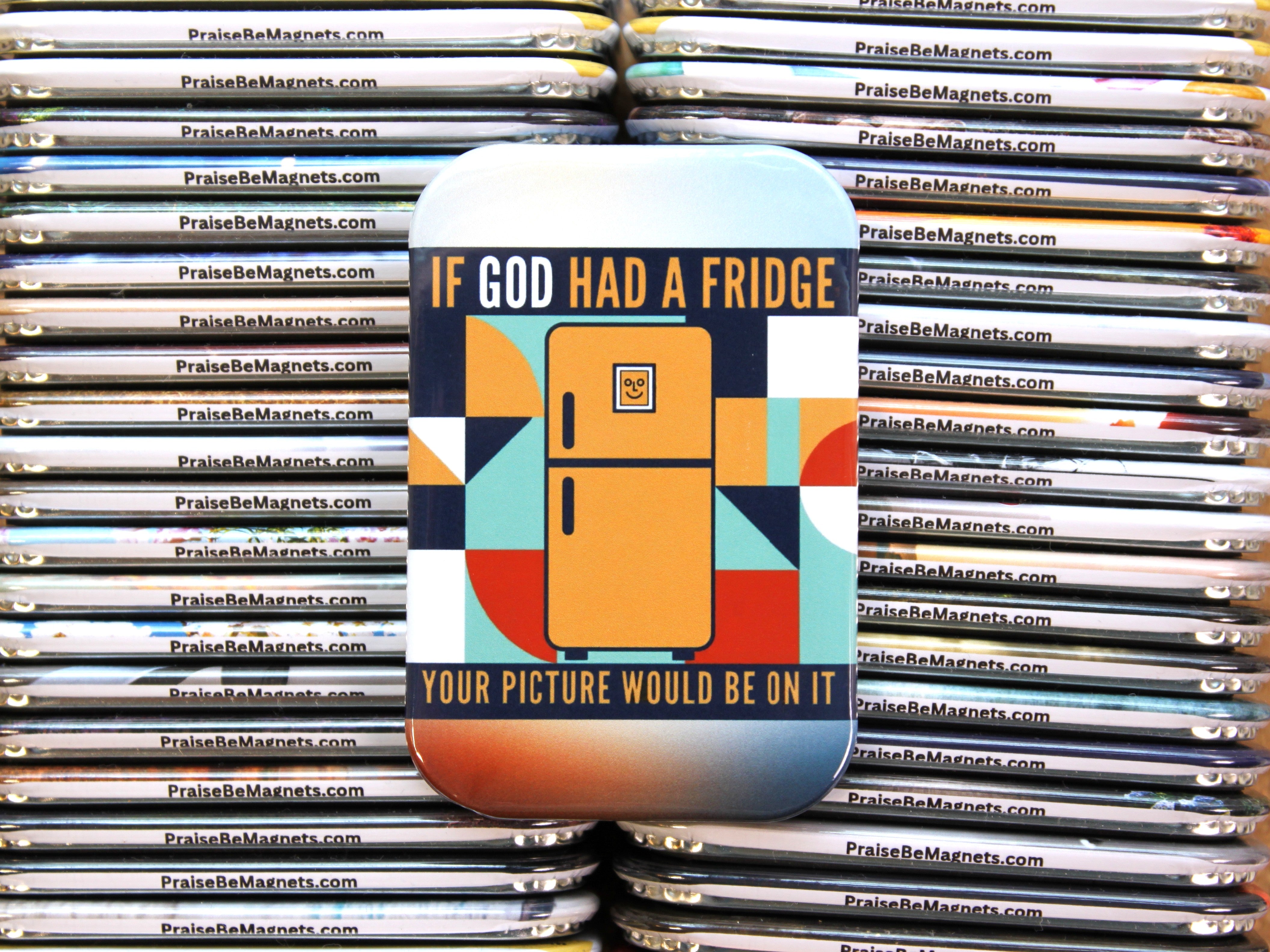 Stack of 'Praise Be Magnets' with a colorful refrigerator magnet featuring text and graphics.