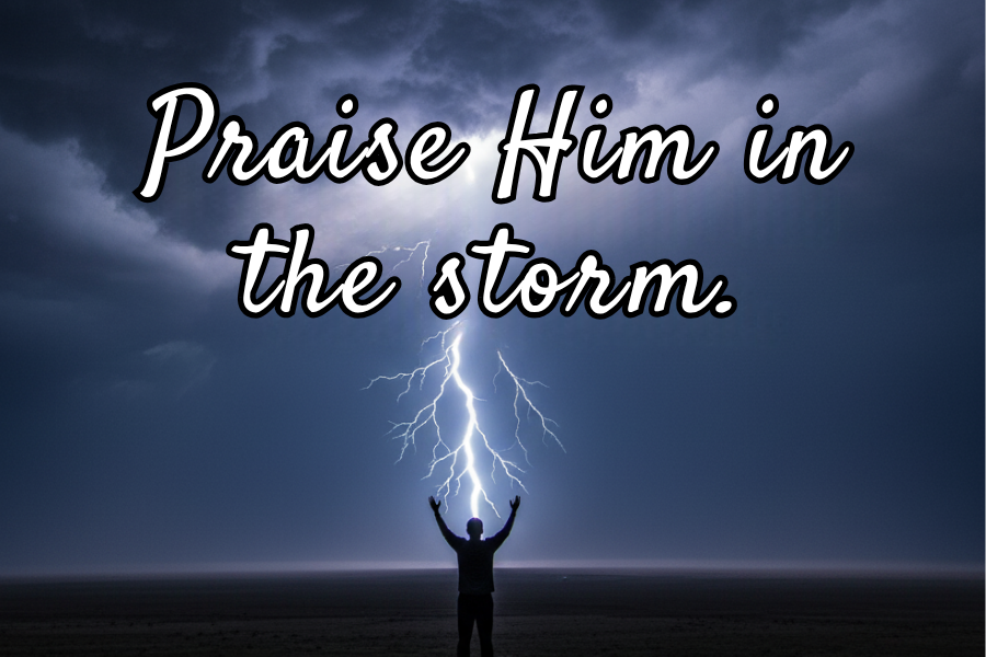Person with arms raised against a dark sky with lightning, accompanied by the text 'Praise Him in the storm'.