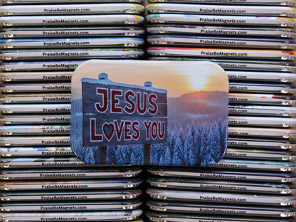 Stack of 'PraiseBeMagnets' with a prominent 'Jesus Loves You' magnet on top.