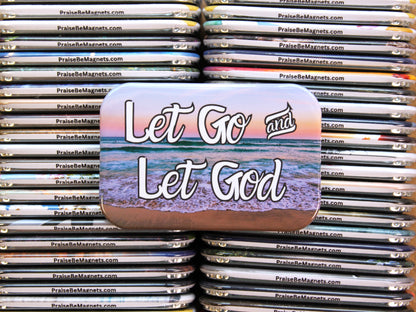 Stack of magnets with 'Let Go and Let God' text and beach design.