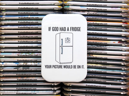 Stack of refrigerator magnets with a central magnet featuring text and a refrigerator illustration.