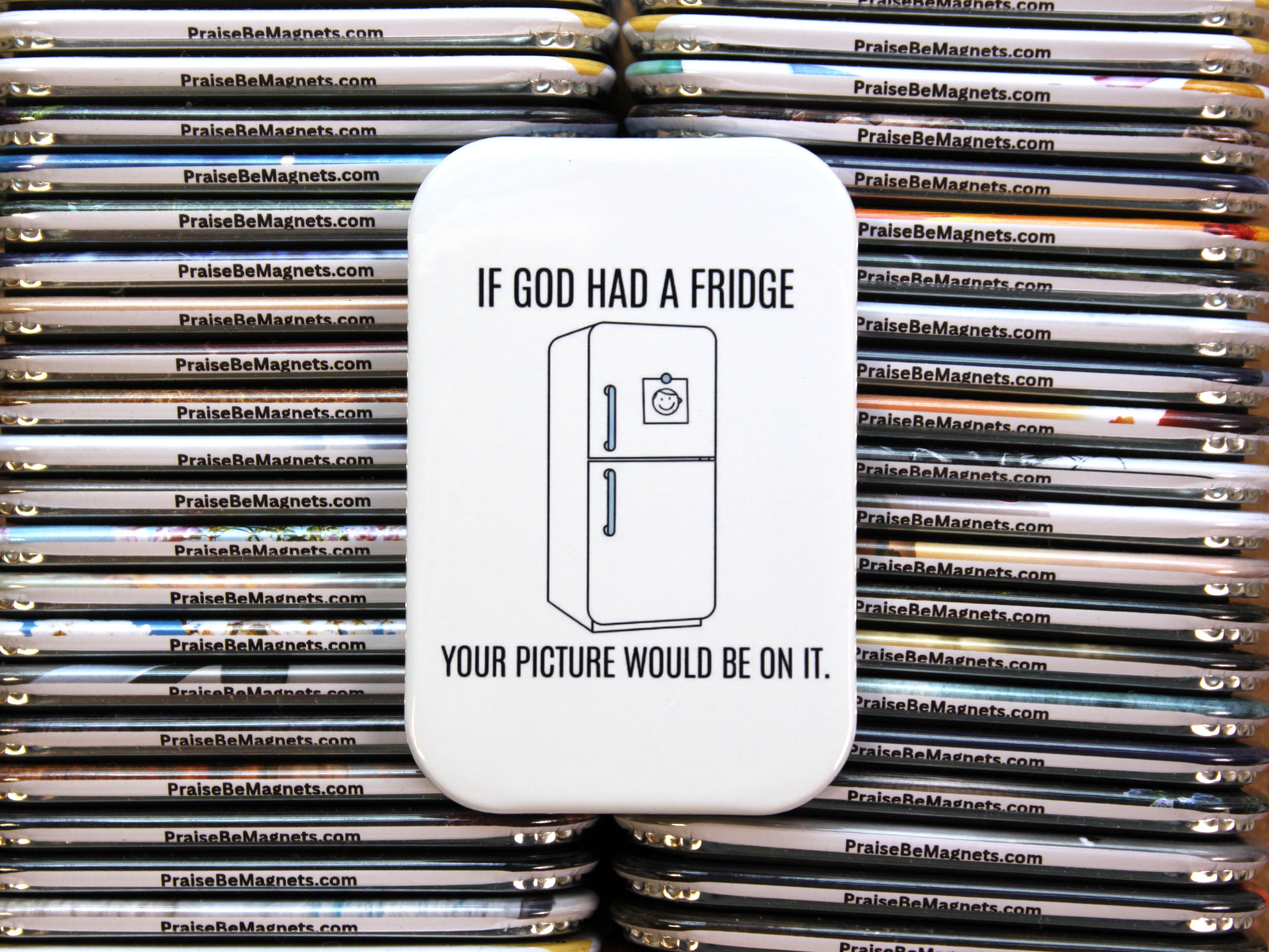 Stack of refrigerator magnets with a central magnet featuring text and a refrigerator illustration.