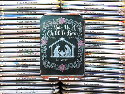 Tin with nativity scene design and 'Unto Us a Child Is Born' text, surrounded by stacks of similar tins.