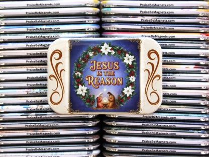 Stack of 'Jesus is the Reason' magnets with a wreath design on a white background.
