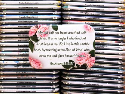 Stack of 'Praise Be' magnets with a central magnet featuring a quote and floral design.